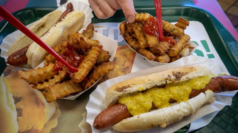 Nathan's hot dogs and fries on tray