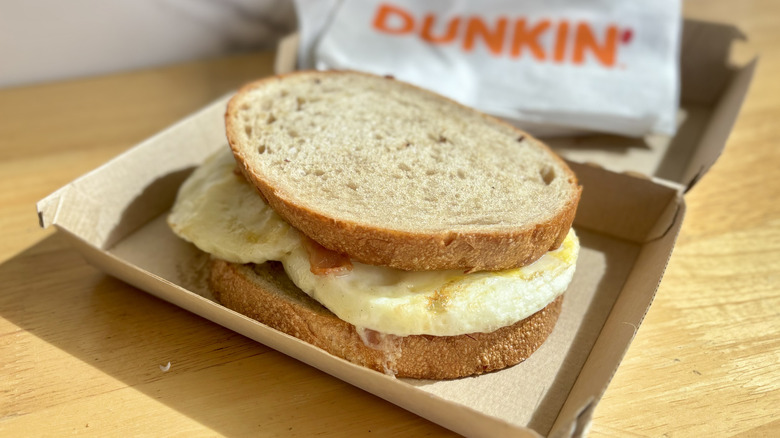 Dunkin' Sourdough Breakfast Sandwich sitting in its box