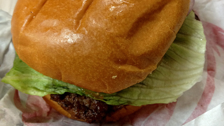 Wendy's hamburger prominently featuring lettuce