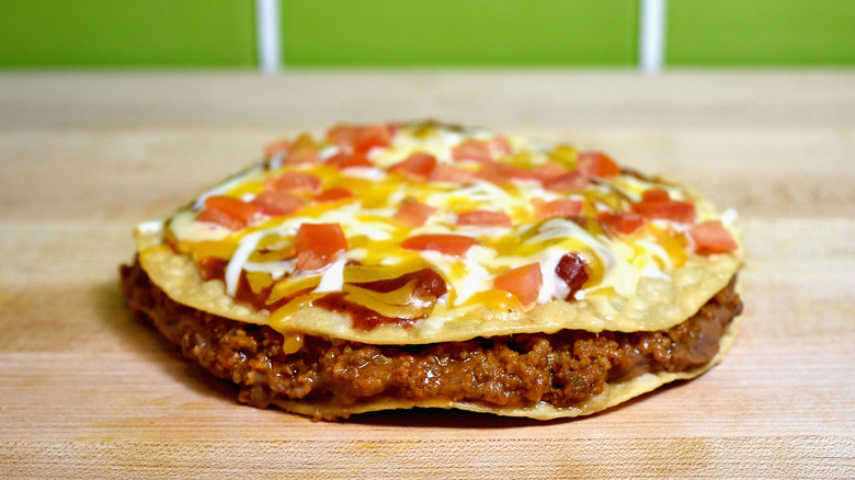 Taco Bell Mexican pizza on table