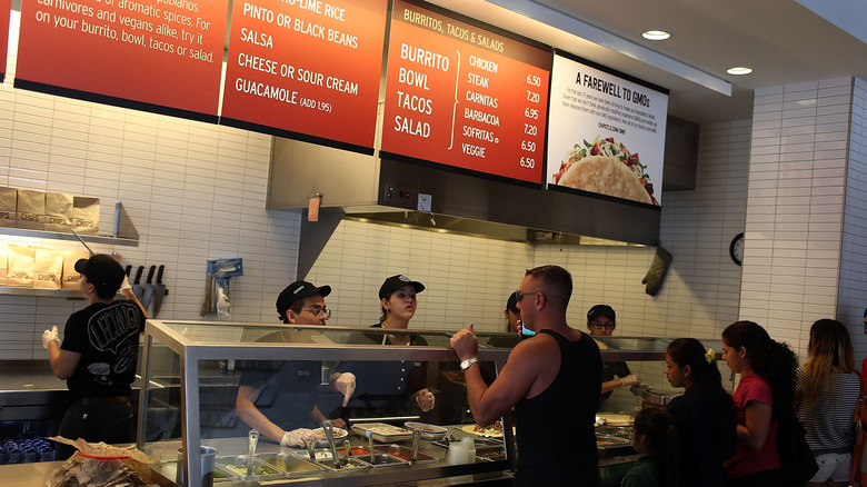 customers lined up at chipotle