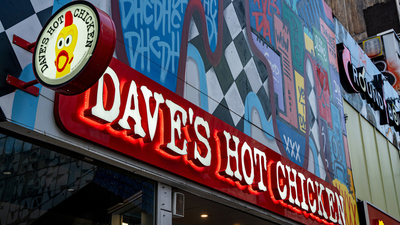 Dave's Hot Chicken sign on side of building