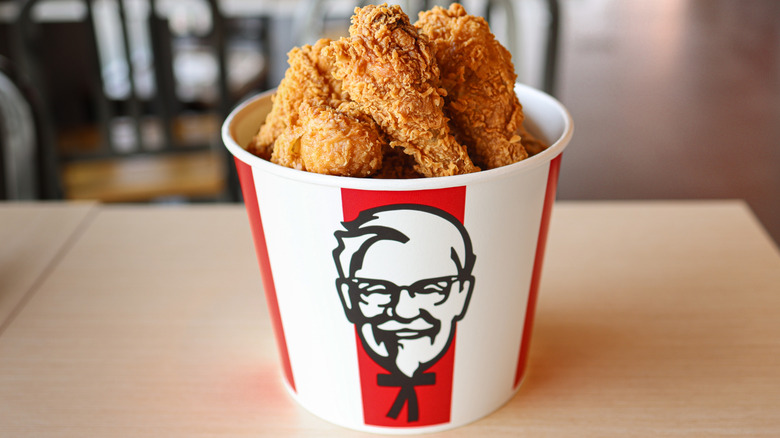 KFC bucket on table in restaurant