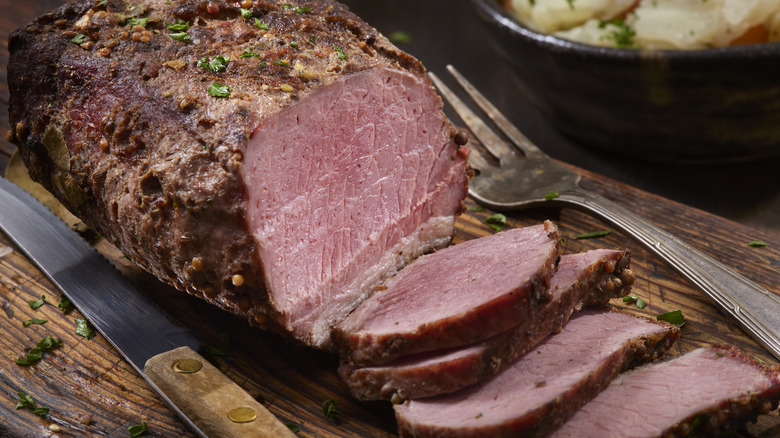 Corned beef on a wooden board