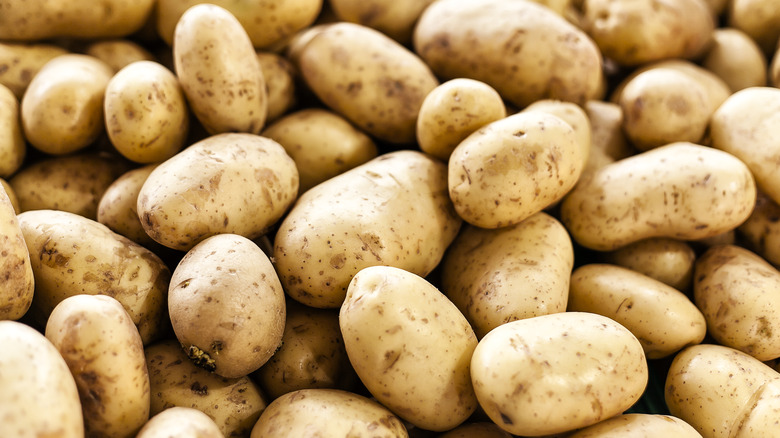 piles of raw potatoes