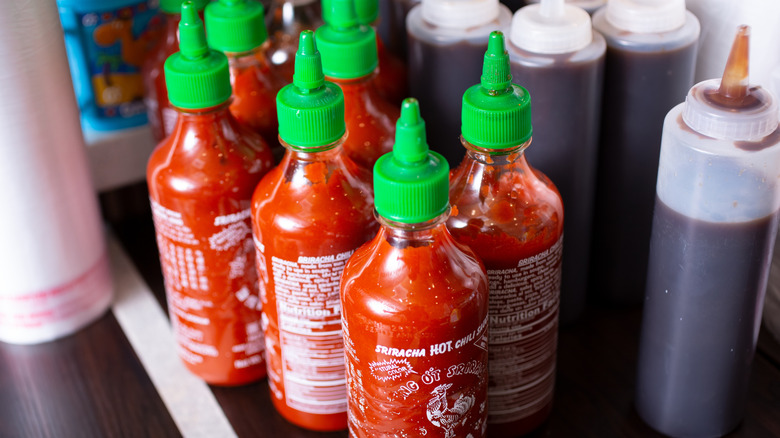 Bottles of sriracha