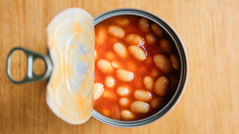 An opened can of baked beans