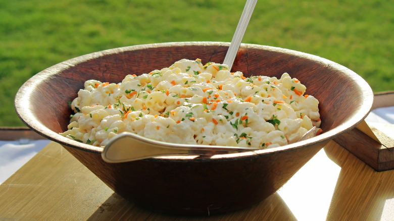 Mac salad in wooden serving bowl