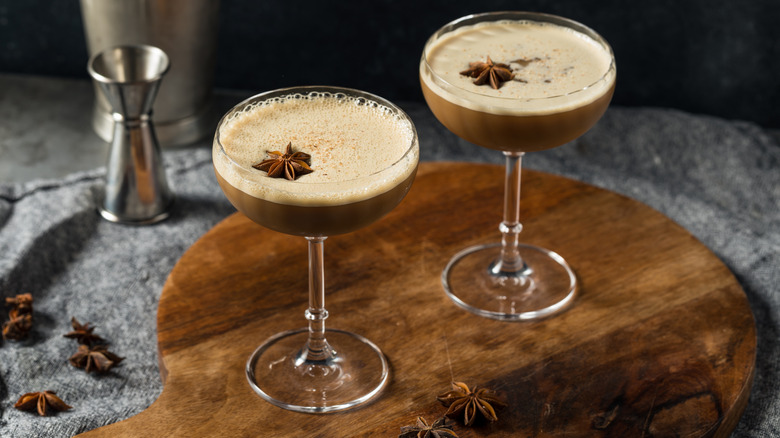 Two chai martinis served with star anise and in coupe glasses.