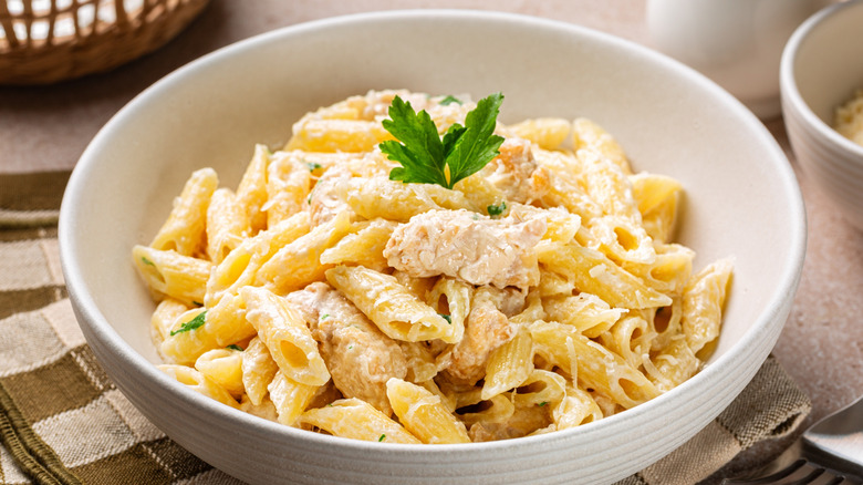 Bowl of chicken Alfredo penne pasta