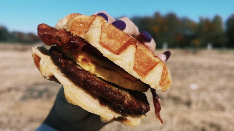 Person holding waffle sandwich from Casey's