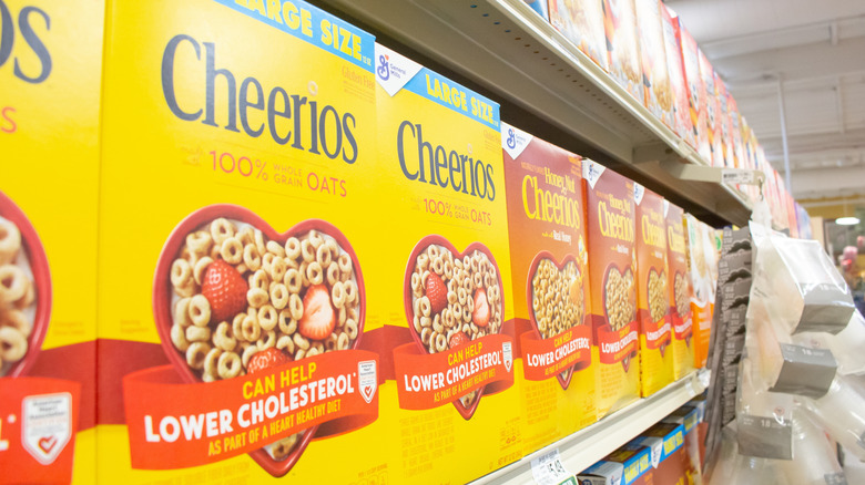 Original Cheerios and Honey Nut Cheerios boxes on store shelf