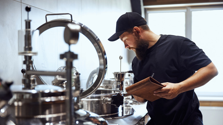 Brewer checking brewery tools