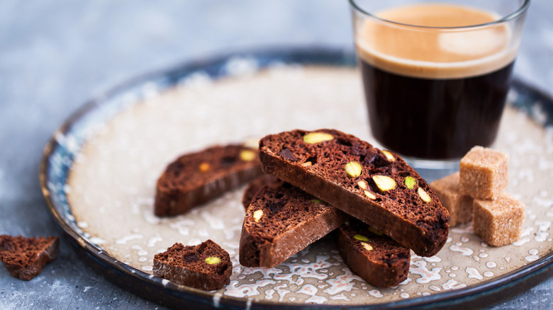 chocolate biscotti on plate with coffee