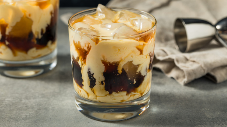 A White Russian cocktail with eggnog in lowball glass