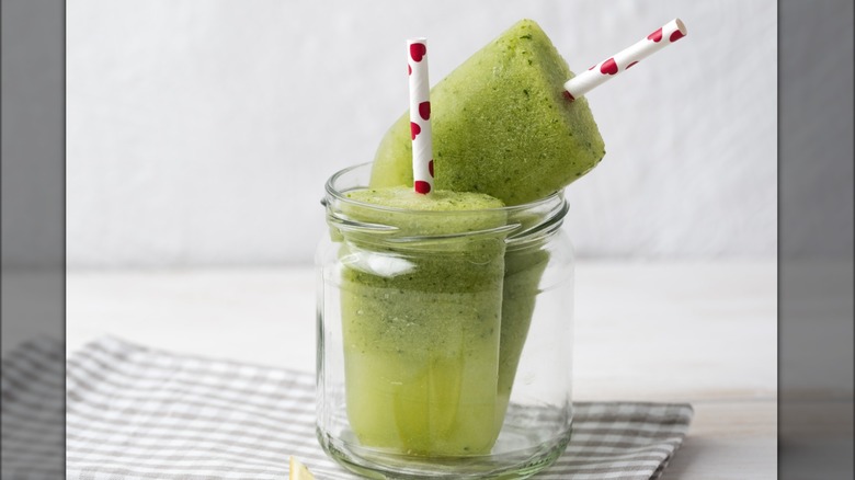 green popsicles in glass