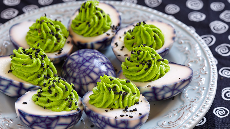 Deviled eggs with spider web effect