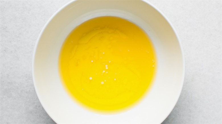 melted butter in white bowl