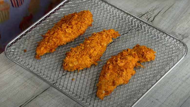 Doritos chicken tenders on air fryer rack