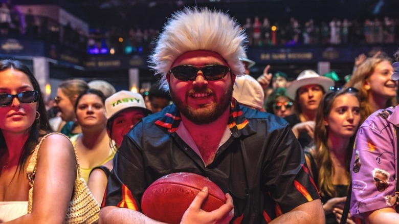 Fan dresses as Guy Fieri at Flavortown Tailgate Super Bowl 2025