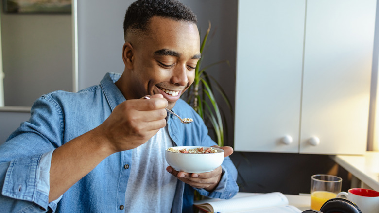 person eating cereal