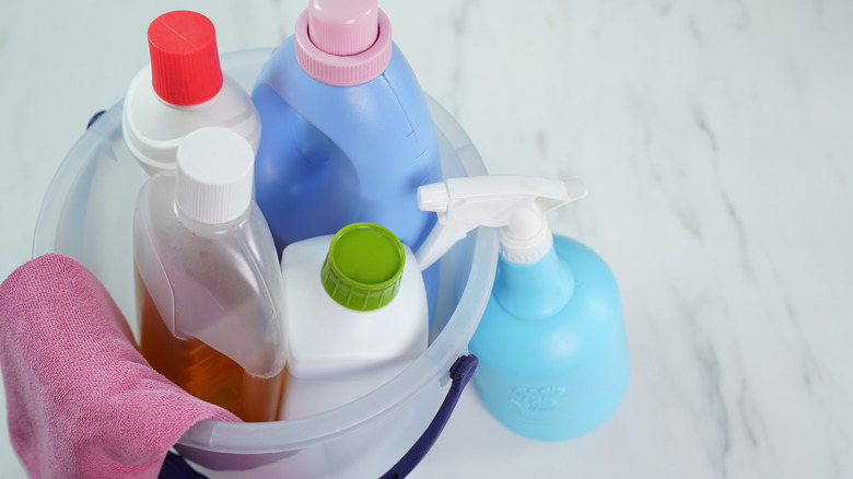 cleaning chemicals in a bucket