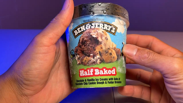 Person holding a pint of Half Baked ice cream