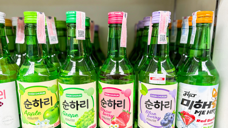 Different flavored bottles of soju at a store