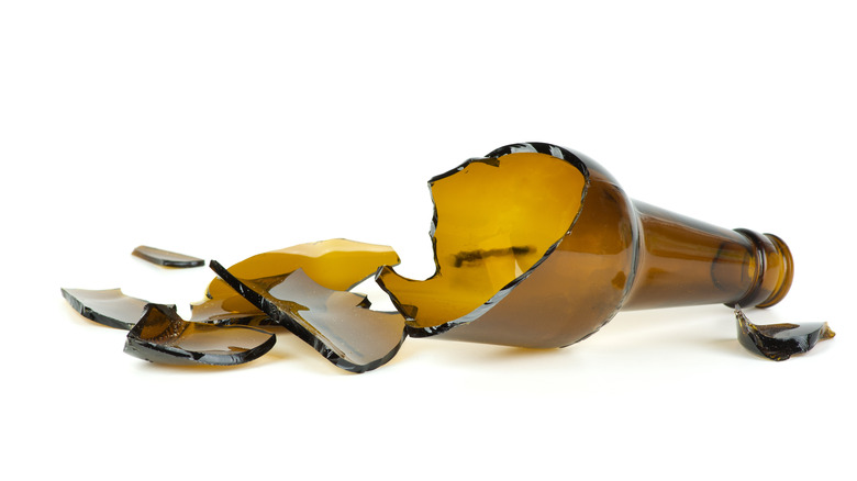 a broken amber bottle