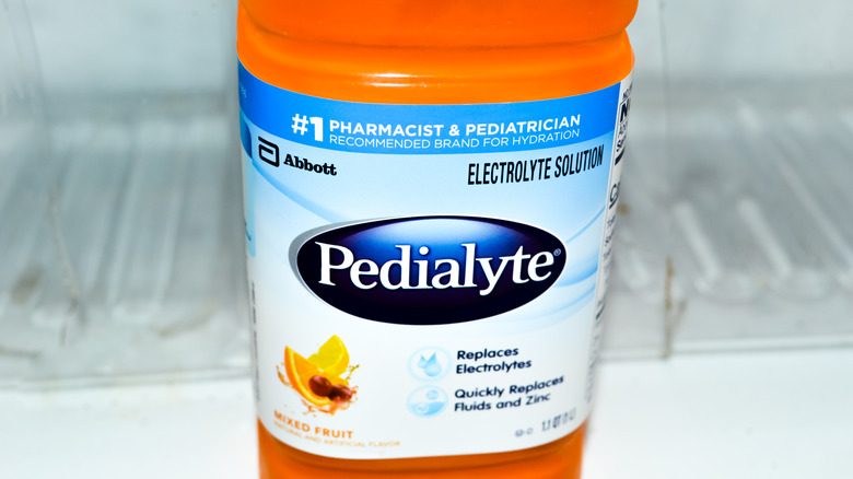 Pedialyte bottle in an empty fridge