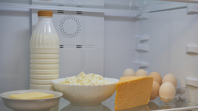 milk and other dairy items in a fridge