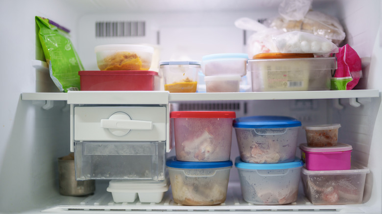 freezer with many food containers