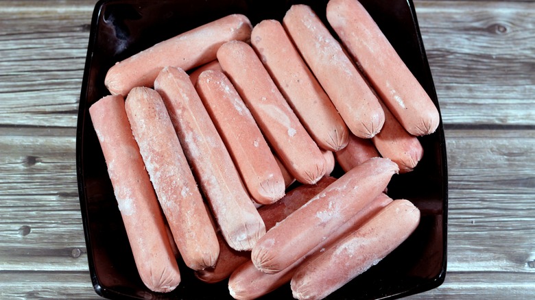 Plate of frozen hot dogs