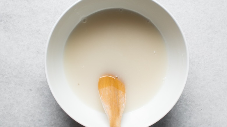 bowl of water with unactivated yeast