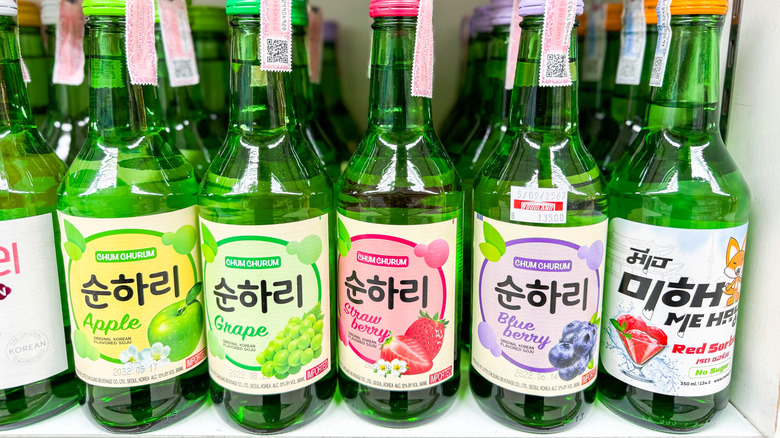 Rows of Korean Soju in different flavors on a store shelf