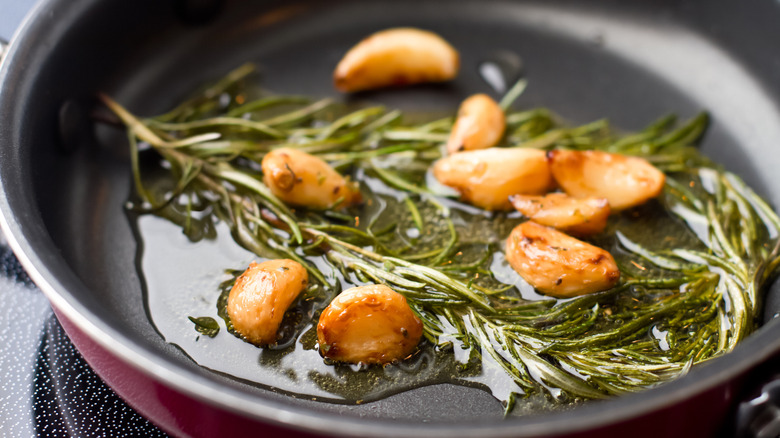 roasted garlic herbs in pan