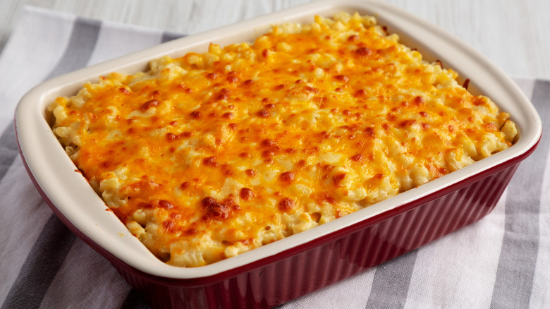 Casserole dish with baked macaroni and cheese