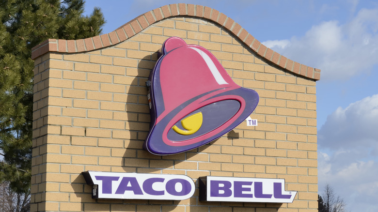 Taco Bell sign in front of restaurant