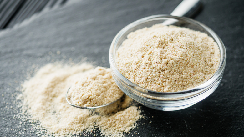 Ground asafoetida or hing spice in a bowl