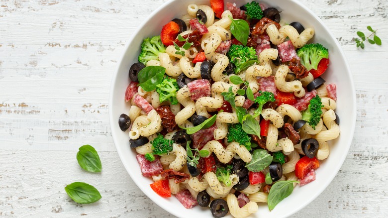 pasta salad with olives in a bowl