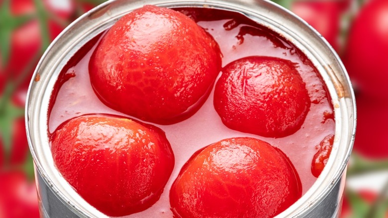 Canned whole cherry tomatoes in an aluminum can