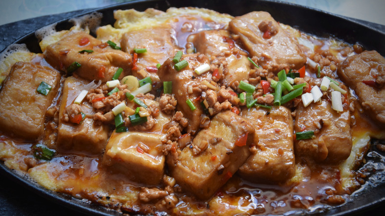 Dish of hairy tofu on eggs with green onion