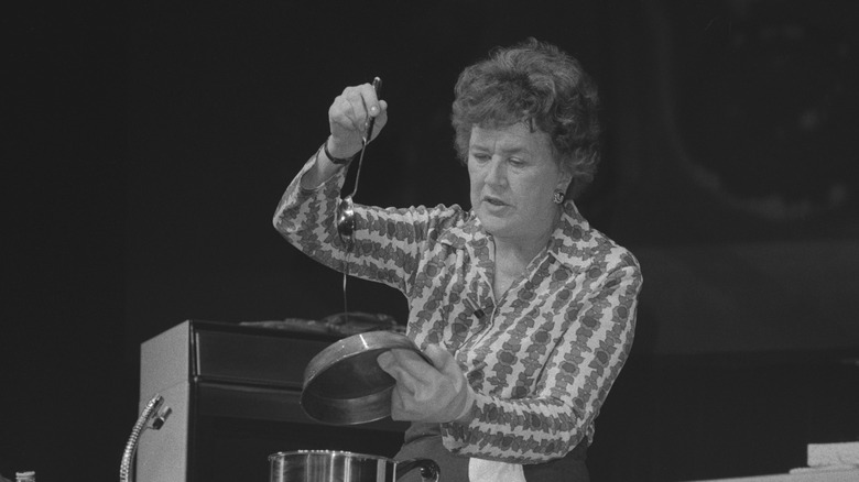 Julia Child cooking.