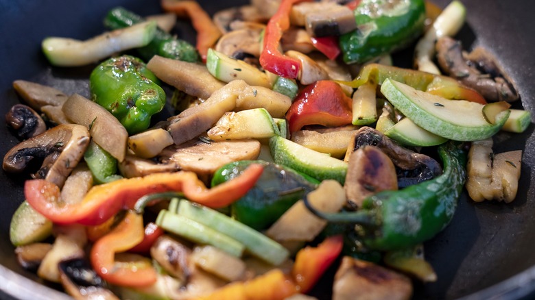 Sautéed vegetables in pan