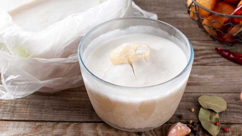 frozen broth in a glass container