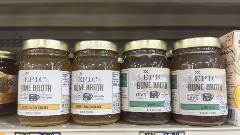 jars of bone broth on a supermarket shelf