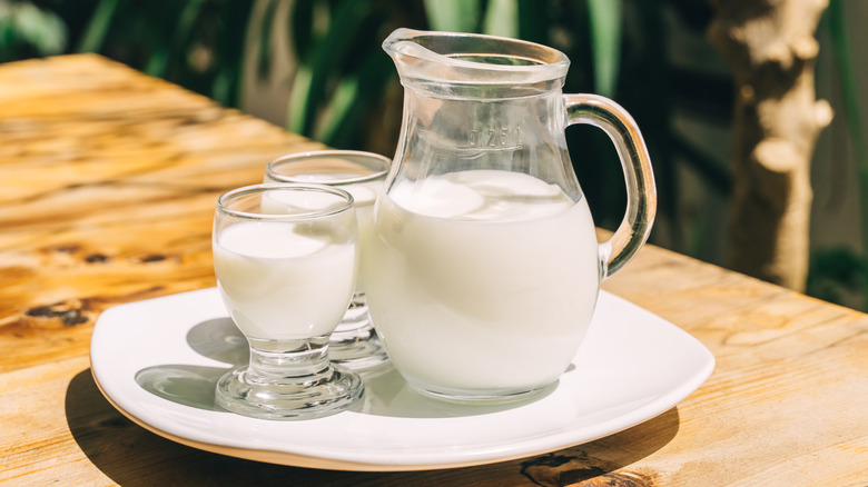 Pitcher and glasses of kefir