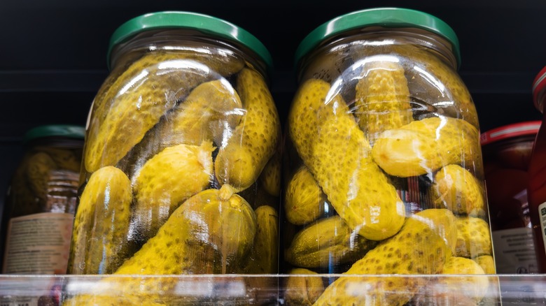 pickle jars shelf grocery store