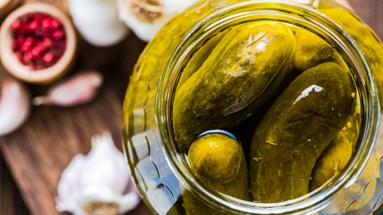 overhead shot of pickles in jar