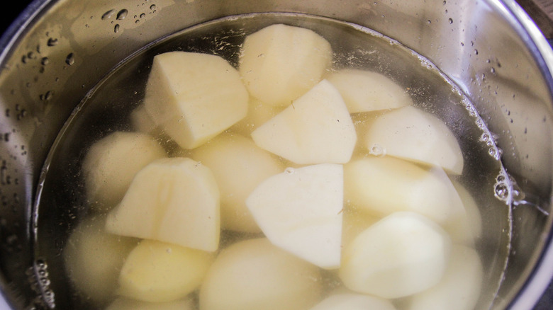 boiling potatoes in a pot